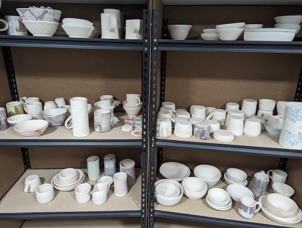 Q.I. Clay Club